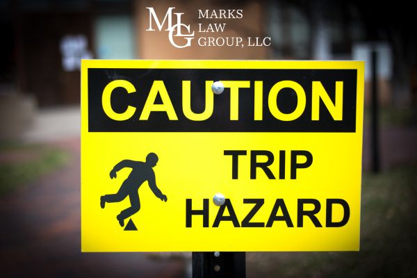 a caution sign that reads trip hazard on someone's property
