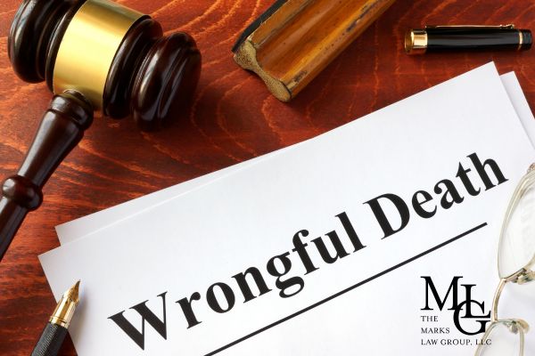 a wrongful death claim next to a gavel