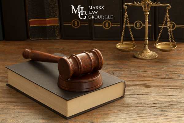 legal books and a gavel on a desk